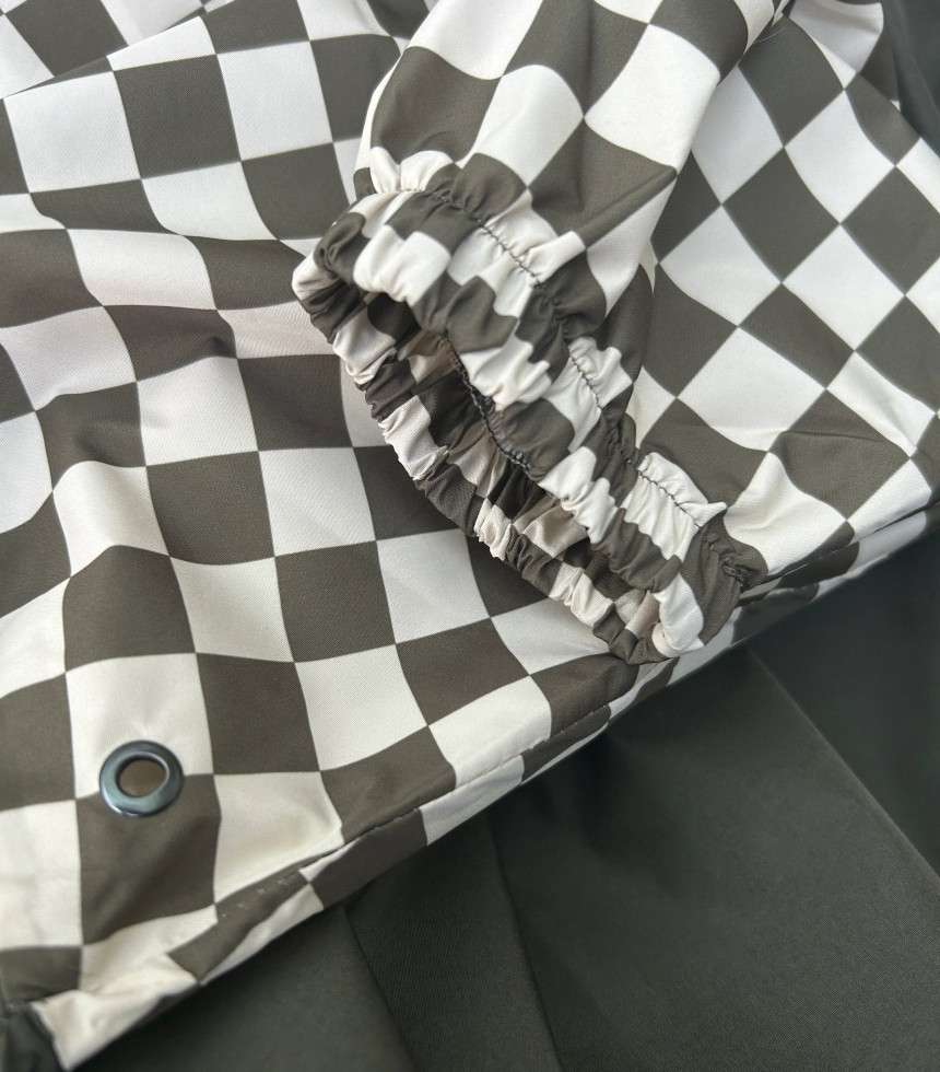 Poncho de pluie damier kaki